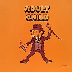 A cartoon drawing of a man with cane and a cigar with the words "Adult Child" written above it. The cover has an orange background