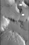 CTX context image showing location of next HiRISE image (letter A box). Location is Ismenius Lacus quadrangle.