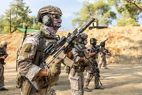 Soldiers of the Cypriot Special Forces using a SCAR-L during an exercise