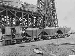 Electric 'motor', with bow collector, hauling ore wagons (c.1913)