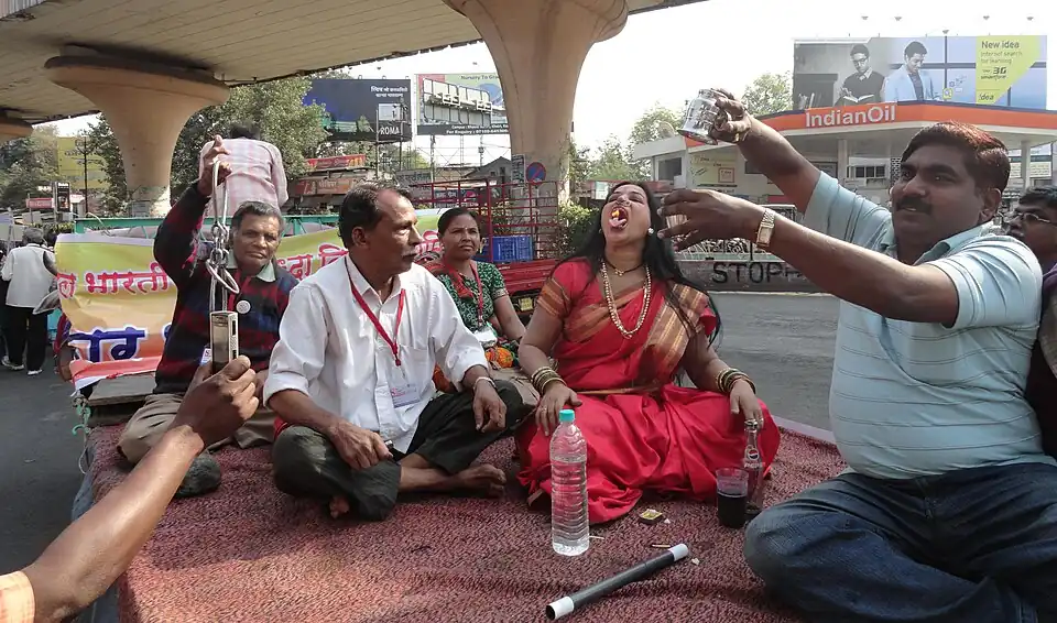 A delegate exposing a so-called 'miracle' of eating fire at the 8th FIRA conference in Nagpur