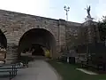 A pedestrian underpass under the bridges northernmost arch