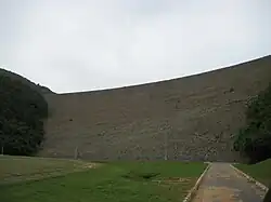 Lake Cerrillos Dam, as viewed from the Luis A. Wito Morales Park